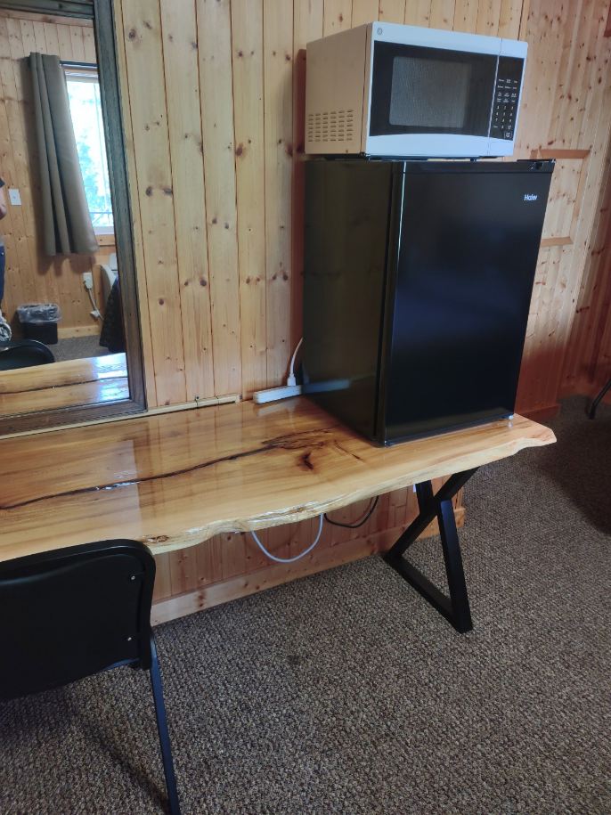Microwave and fridge in room
